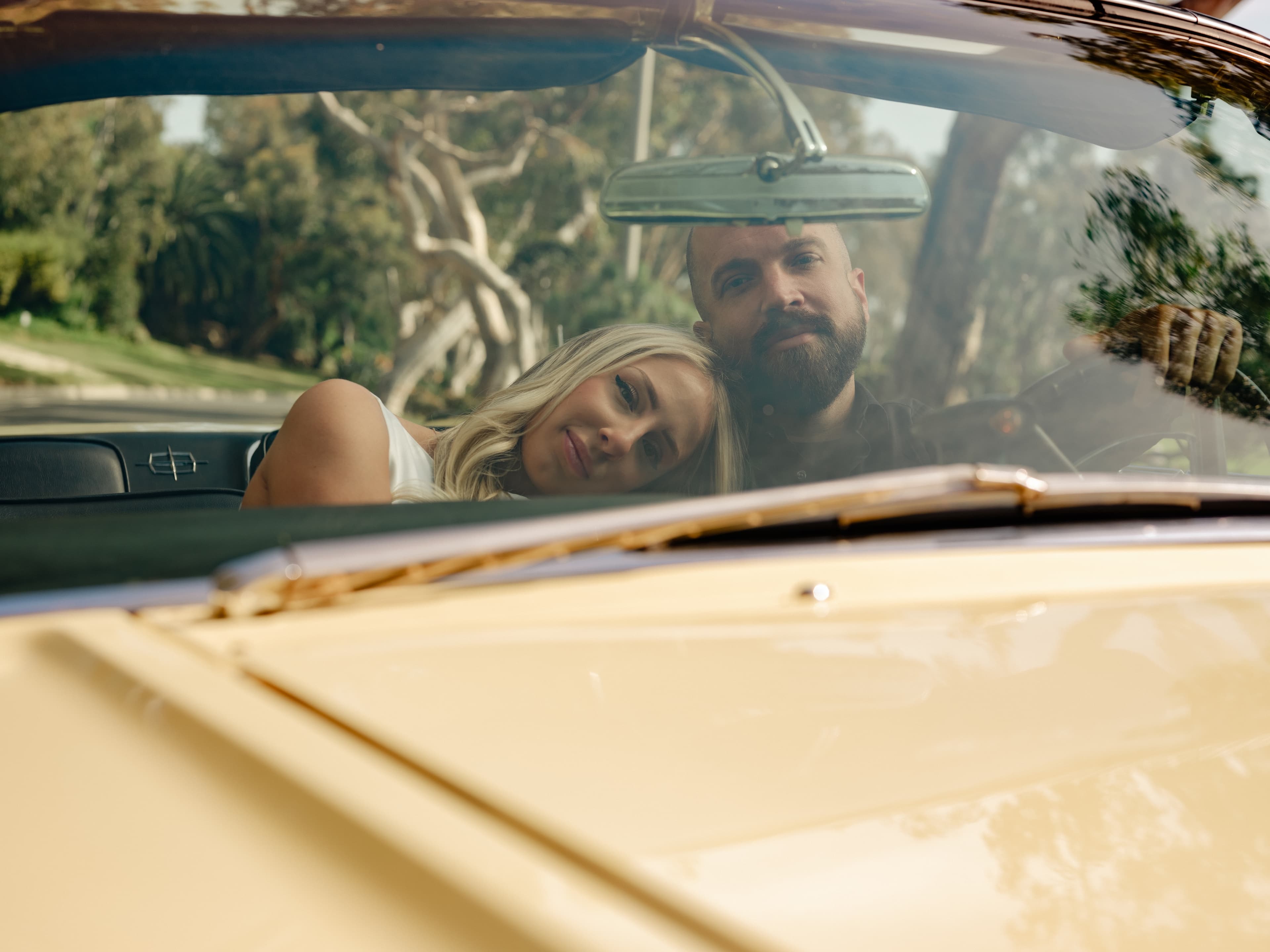 Couple in vintage convertible